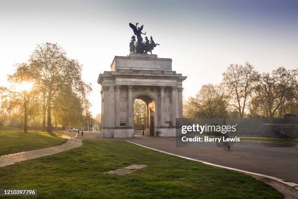 Wellington Arch, a 19th-century memorial arch topped by a bronze sculpture, Hyde Park Corner on 16th April 2020 in London, United Kingdom. Normally...