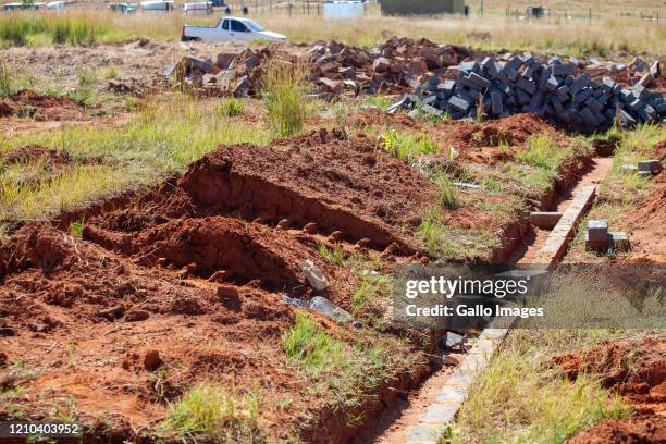 General view of houses and shacks that were allegedly torn down by Red Ants at the Lawley informal settlement on April 16, 2020 in Johannesburg,...