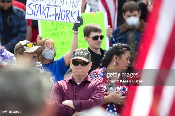 Rep. Robert Sutherland gathers with hundreds of others at a 'Hazardous Liberty! Defend the Constitution!' rally to protest the stay-at-home order, at...