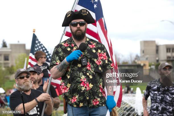 Matt Marshall of the right-wing group Washington State Three Percent speaks at a 'Hazardous Liberty! Defend the Constitution!' rally to protest the...