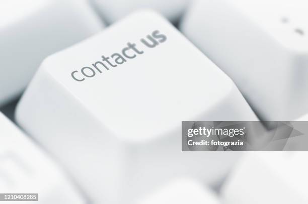 computer key - support concept - contact us stock pictures, royalty-free photos & images