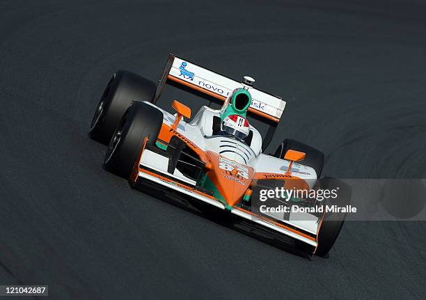 Charlie Kimball drives the Levemir and NovoLog FlexPen Chip Ganassi Racing Dallara Honda on track during practice for the IZOD IndyCar Series...