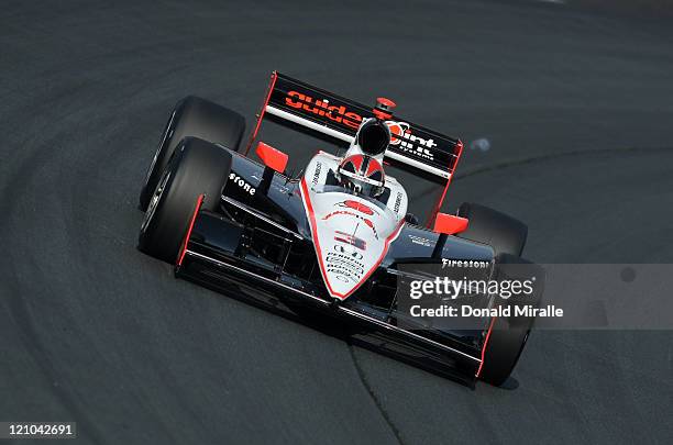 Helio Castroneves of Brazil drives the Guidepoint Systems Team Penske Dallara Honda on track during practice for the IZOD IndyCar Series...