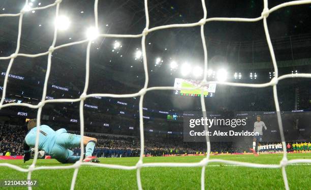 Tim Krul of Norwich City saves the penalty taken by Gedson Fernandes of Tottenham Hotspur to win the penalty shoot out during the FA Cup Fifth Round...