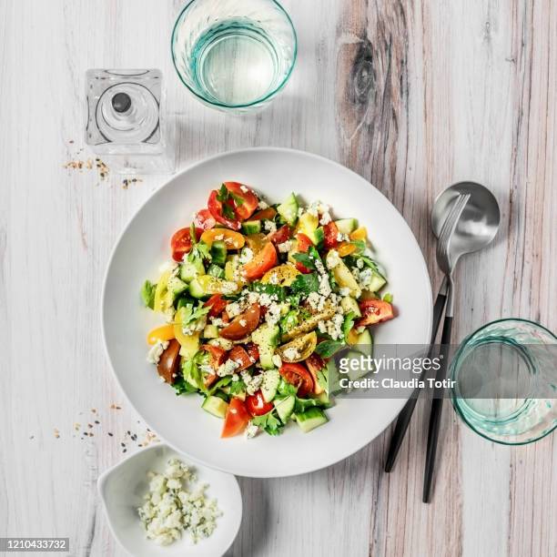 bowl of fresh salad on wooden background - salad bowl stock pictures, royalty-free photos & images