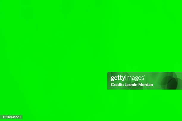 green paper with soft lines - chroma key stock-fotos und bilder