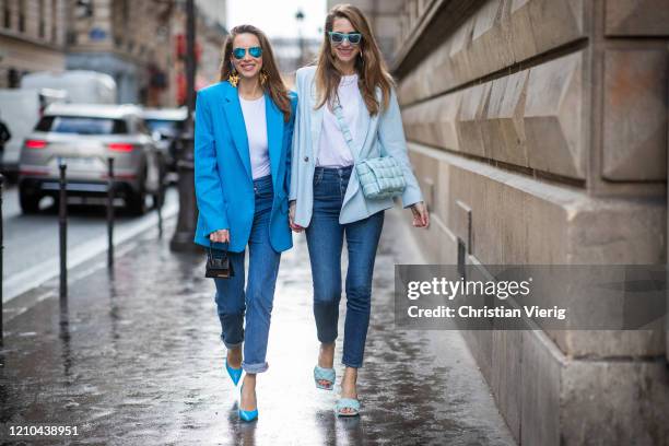 Alexandra Lapp is seen wearing a turquoise oversized jacket from The Attico, turquoise pumps from Amina Muaddi, white muscle-Shirt from The Frankie...