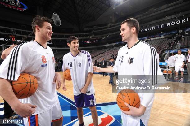 Danilo Gallinari of the Sophomore Team, Omri Casspi of the Rookie Team, and Kevin Love of the Sophomore Team shares a laugh before the T-Mobile...