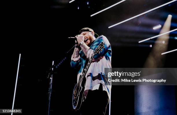 James Arthur performs on stage at Motorpoint Arena on March 04, 2020 in Cardiff, Wales.
