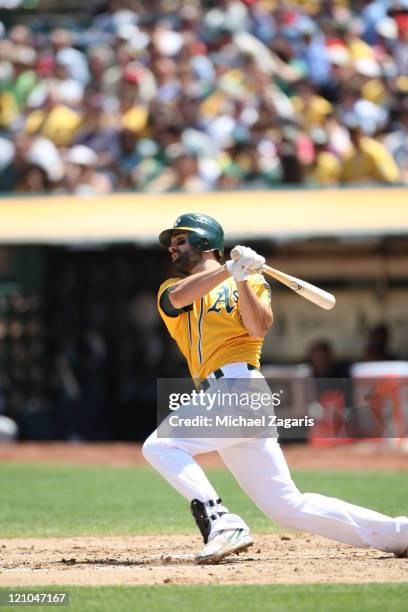 Conor Jackson of the Oakland Athletics bats against the Minnesota Twins at the Oakland-Alameda County Coliseum on July 31, 2011 in Oakland,...