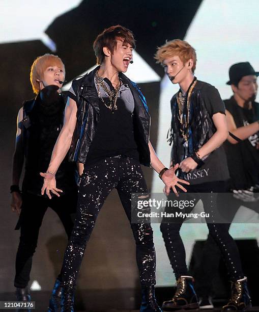 Jonghyun of SHINee perform onstage during the Incheon Korean Wave Festival 2011 at Incheon World Cup Stadium on August 13, 2011 in Incheon, South...