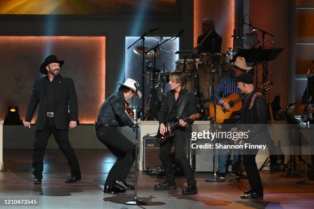 Garth Brooks, Keith Urban, and members of the Garth Brooks touring band perform at The Library of Congress Gershwin Prize tribute concert at DAR...