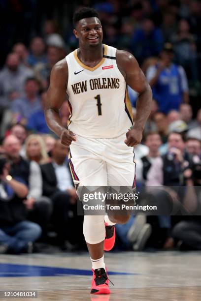 Zion Williamson of the New Orleans Pelicans reacts against the Dallas Mavericks in the second quarter at American Airlines Center on March 04, 2020...