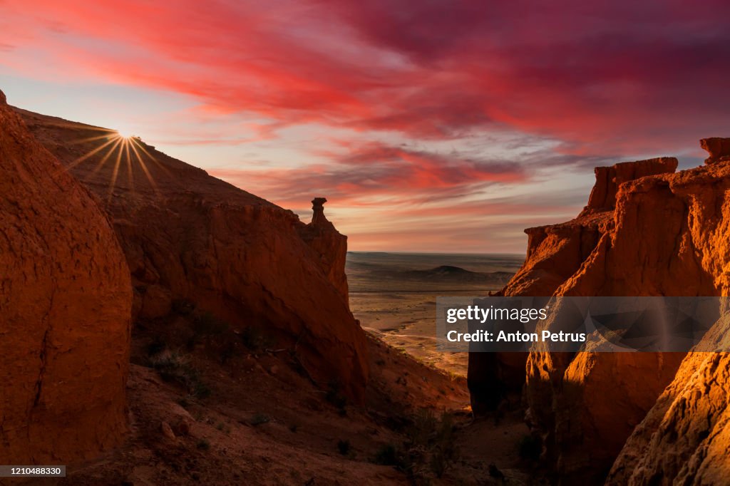 Mongolia, Gobi desert, Bayanzag valley, Flaming Cliffs at sunset.