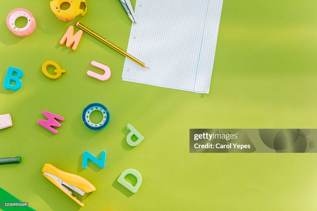 Top view blank empty sheet and school supplies