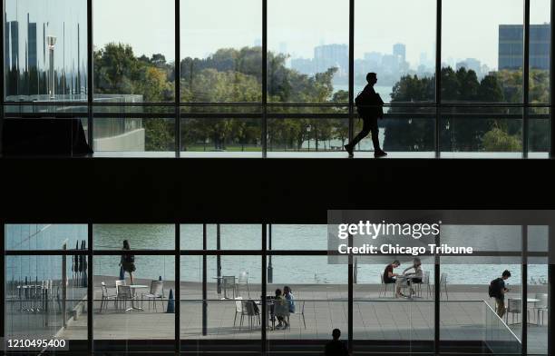 Students at Northwestern University's Kellogg School of Management gather Monday, Oct. 8 at the school's campus in Evanston. Administrators across...