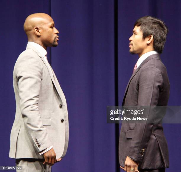 Floyd Mayweather of the United States and Manny Pacquiao of the Philippines come face-to-face in Los Angeles on March 11 during a press conference to...