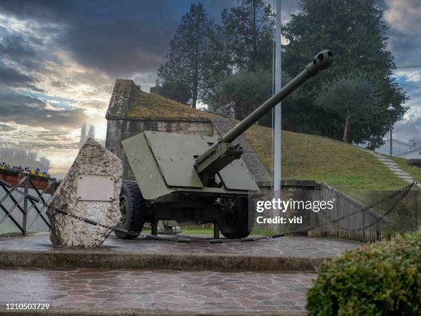 artillery piece at the entrance of desenzano del garda a little village in garda lake