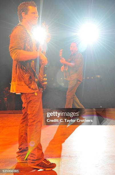 Stefan Lessard and Dave Matthews of Dave Matthews Band perform at The Odeum during Rothbury 2008 on July 5, 2008 in Rothbury, Michigan.