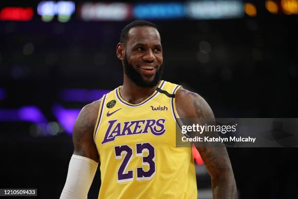LeBron James of the Los Angeles Lakers stands on the court in a game against the Philadelphia 76ers during the first half at Staples Center on March...