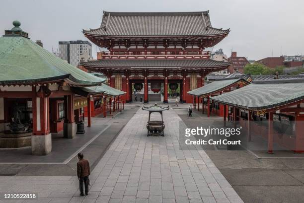 Small number of people visit Sensoji Temple, one of Tokyos most popular tourist sites, on April 21, 2020 in Tokyo, Japan. Foreign visitor numbers to...