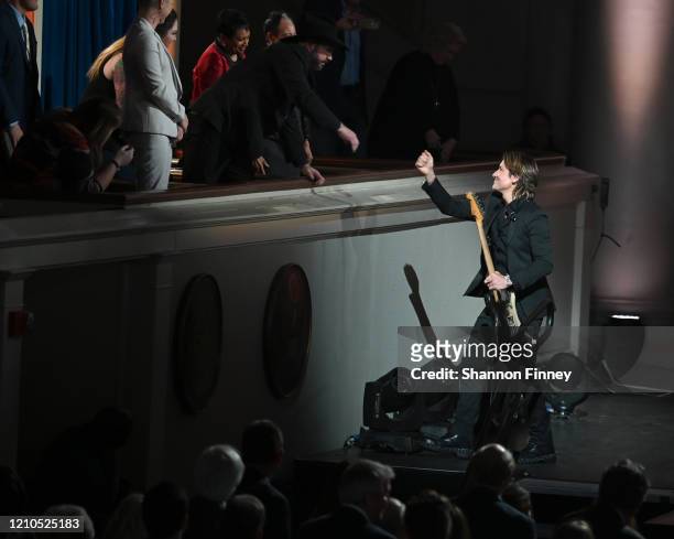 Keith Urban greets Garth Brooks at The Library of Congress Gershwin Prize tribute concert at DAR Constitution Hall on March 04, 2020 in Washington,...