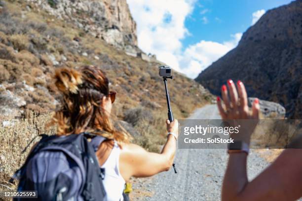 vlogging their hike - action camera stock pictures, royalty-free photos & images