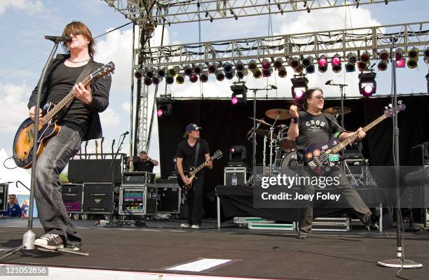 Lead singer John Rzeznik , bassist Robby Takac and drummer Mike Malinin of The Goo Goo Dolls perform live in concert during Qualifying day for the...