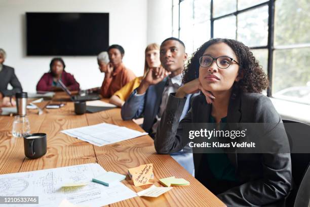 businesswoman sitting by entrepreneurs in meeting - listening skills stock pictures, royalty-free photos & images