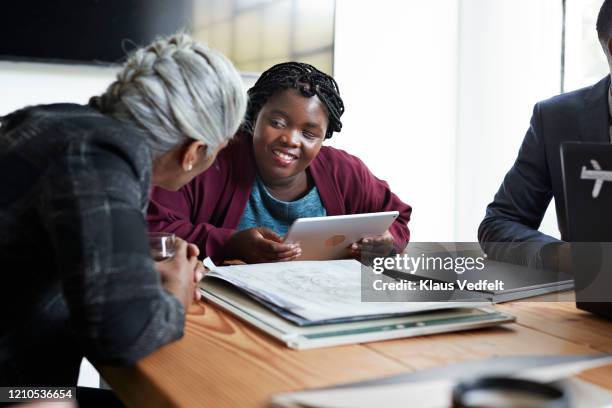 entrepreneur and coworker discussing in office - blindness imagens e fotografias de stock