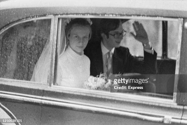 Birgitte, Duchess of Gloucester and Prince Richard, Duke of Gloucester in the wedding car following their wedding ceremony in St Andrew's Church at...