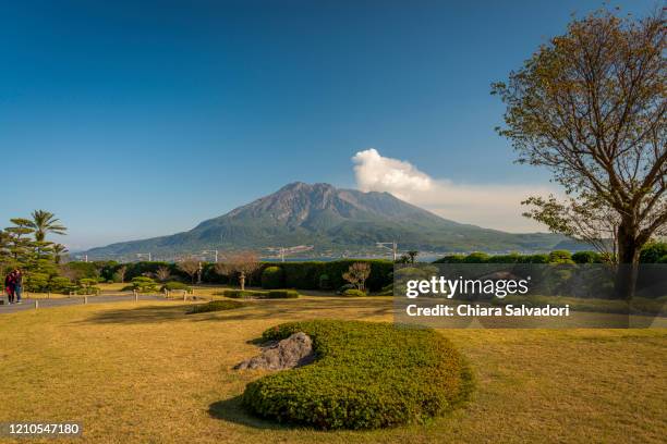 mt. sakurajima from senganen garden - mt sakurajima stock pictures, royalty-free photos & images