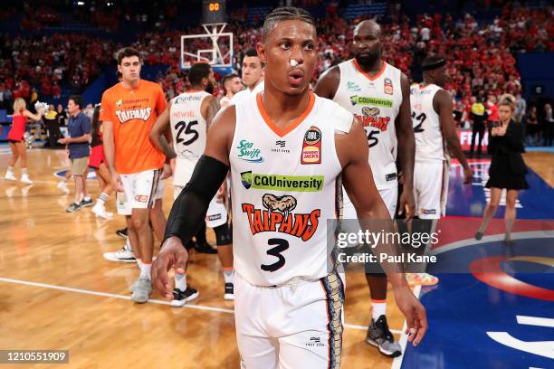 Scott Machado of the Taipans walks from the court after being defeated during game three of the NBL Semi Final Series between the Perth Wildcats and...