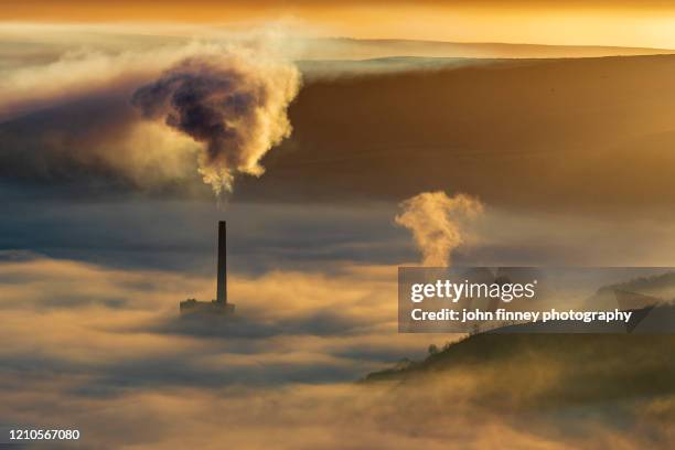 pollution at sunrise, castleton, derbyshire, peak district. uk - växthusgas bildbanksfoton och bilder