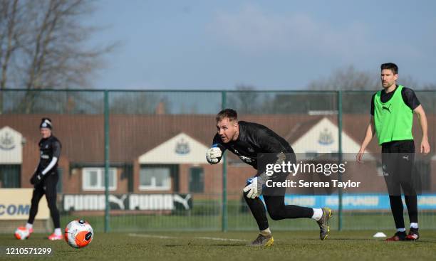 Goalkeeper Rob Elliot throws the ball into play during the Newcastle United Training Session at the Newcastle United Training Centre on March 05,...