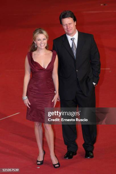 Actress Reese Witherspoon and director Gavin Hood attend the premiere of "Rendition" at Auditorium of Rome 2nd RomaCineFest