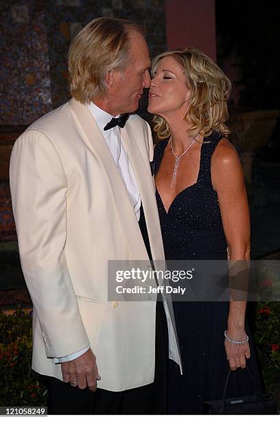Golfer Greg Norman and Tennis Pro Chris Evert attend the Chris Evert/Raymond James Pro Celebrity tennis classic cocktail reception and silent auction...