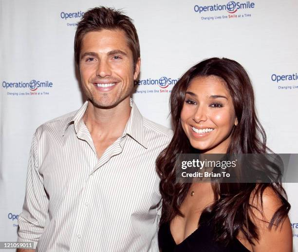 Roselyn Sanchez and Eric Winter attend 8th Annual Operation Smile Pre-Gala Kick-Off Reception at Lladro Boutique on October 1, 2009 in Beverly Hills,...