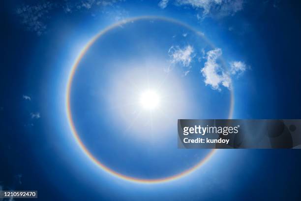beautiful sun halo phenomenon in thailand. - light natural phenomenon stock pictures, royalty-free photos & images