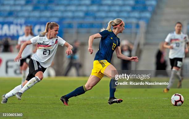 Lena Petermann of Germany Women battles for the ball with Amanda Ilestedt of Sweden Women during the Germany v Sweden, Algarve Cup match at Algarve...