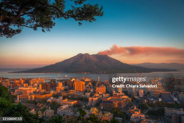 a panoramic view of kagoshima and mt. sakurajima - kyushu stock-fotos und bilder