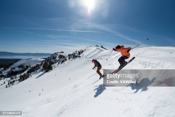 skiers enjoy the beauty and sun of california mountain ski life - lake tahoe skiing stock pictures, royalty-free photos & images
