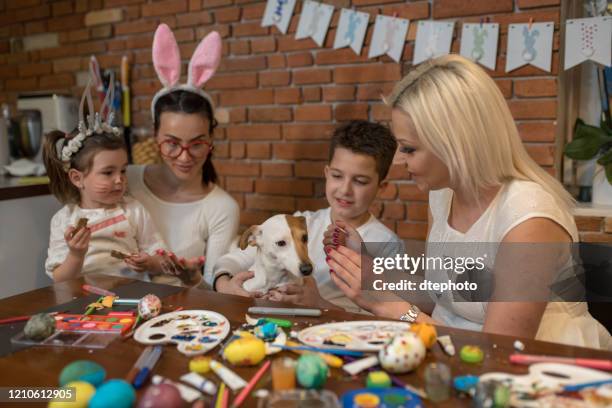 easter preparations - dog easter stock pictures, royalty-free photos & images