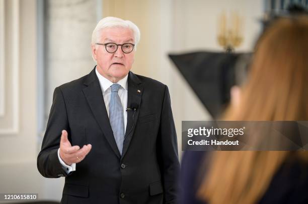 In this handout photo provided by the German Government Press Office , Federal President Frank-Walter Steinmeier records his video message to the...
