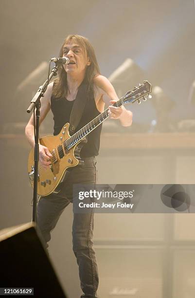 Guitarist Malcolm Young of the Australian rock band AC/DC performs in concert on their 'Black Ice World Tour' at the Conseco Fieldhouse on November...