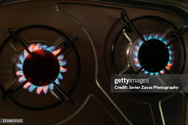 gas flame - stove top stock-fotos und bilder