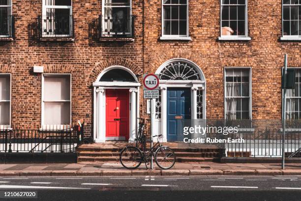 dublin classic color painted doors in portobello district - blue house red door stock pictures, royalty-free photos & images