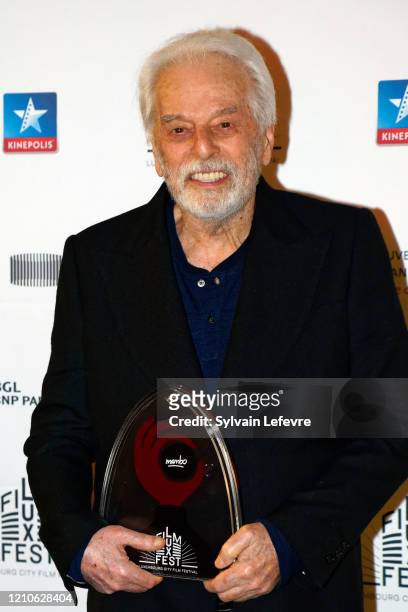 Director Alejandro Jodorowsky poses for photos after the tribute paid to him at the opening ceremony of 10th Luxembourg City Film Festival on March...