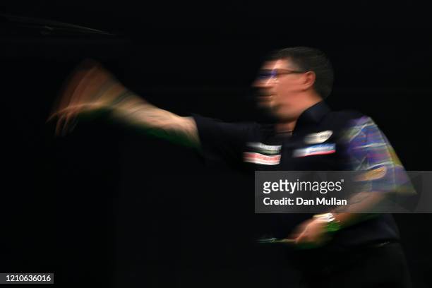 Gary Anderson of Scotland throws during his match against Luke Humphries of England during Night Five of the Premier League Darts at Westpoint on...