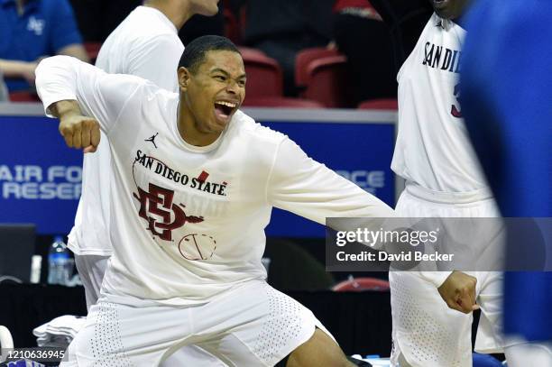 Keshad Johnson of the San Diego State Aztecs reacts after a basket against the Air Force Falcons during a quarterfinal game of the Mountain West...